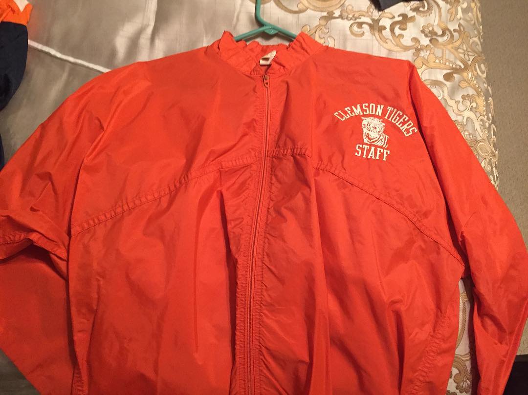 Yep...here is the rain jacket issued to me from Clemson Football my freshman year (1992) when working in the Clemson Athletic Video Services. Our office was in the old Jervey Ticket Office next to the vault. That department was originally created under Coach Ford in the late 80's to transition from film to video tape, specifically for faster film grading. I captured six years of football practices from 1991 - 1997, specifically middle drill, pass skeleton, and team defense. I started training my senior year in high school (91-92) when Coach Smiley Sanders recommended me to John Ballinger for the job! It is amazing to see how our offense and defense has changed over the years! I spent most of my time in Tower One (that is now wheee the new practice facility sits along with Tower. #GoTigers #AllIn