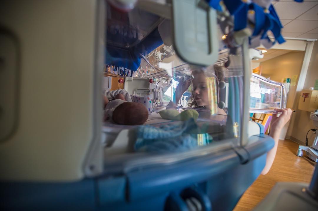 I love this picture. I love seeing Rosebud peeking into Henry’s isolette, checking on him this morning. Henry is looking right at her, both staring at each other. They are forming their bond, becoming kindred spirits. I think I will hold this picture for the day when Henry and Rosebud fight for the first time. #NICU #Rosebud #TwinsLife #Canon #5Dmkiii