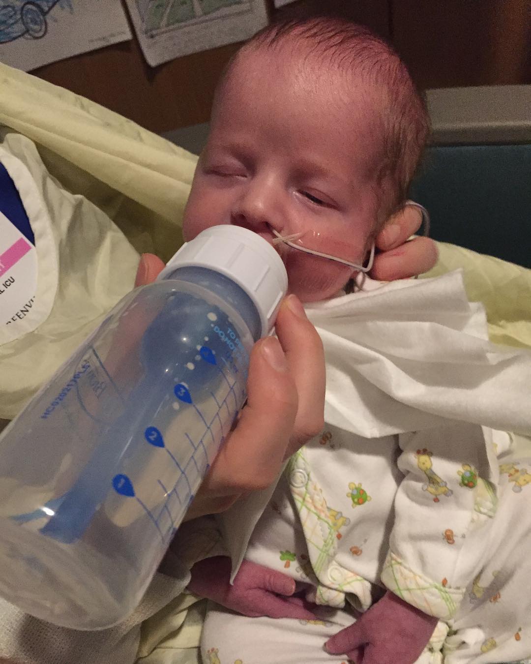 Henry (pictured above) and George both had a bottle at 9pm tonight…that is 3 in one day! #Boom #TwinsLife #NICU #tw