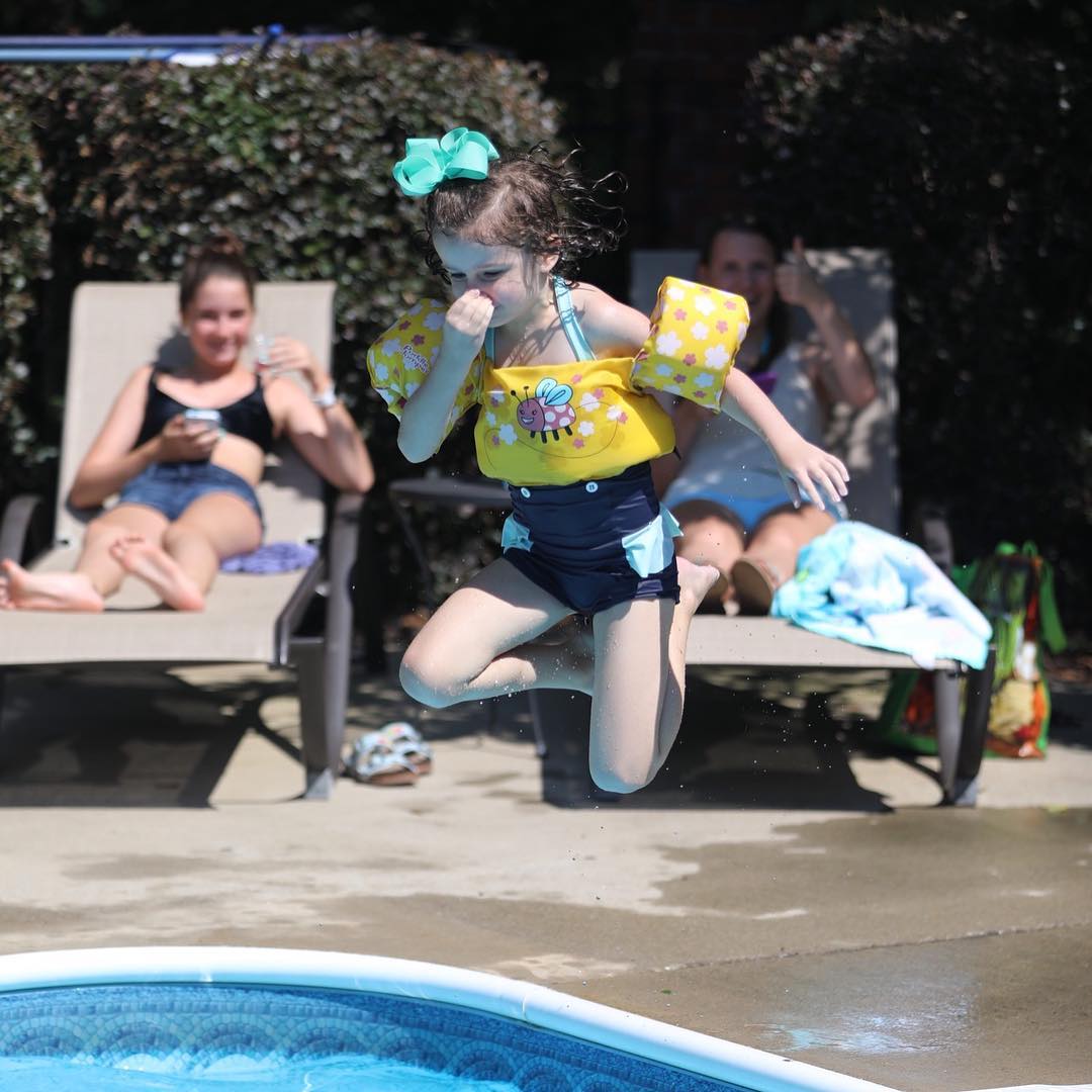 And so this is a happy Rosebud…I finally get to see her jump in the pool! She pushed past her fear and took the plunge! #canon #camerapapa #5dmarkiv